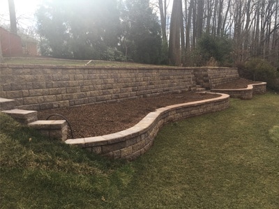 Wallstone retaining wall system and raised beds. 