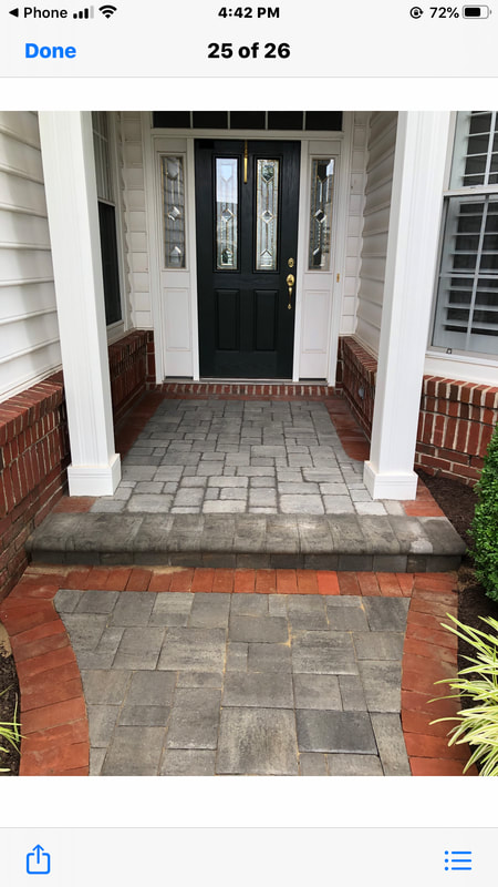 Paver stoop with brick soldier course. 