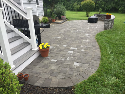 Paver patio.  Paver wallstone seating walls with capstone. 