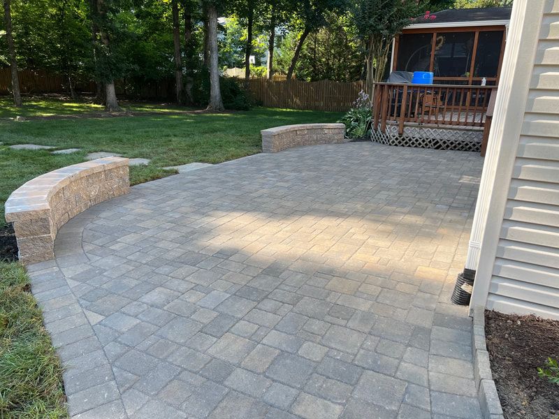 Paver patio with wallstone seating walls. 