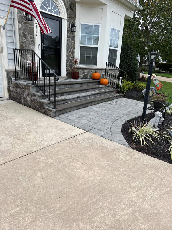 Paver walkway from driveway to stoop.  Paver stoop with bullnose steps. 