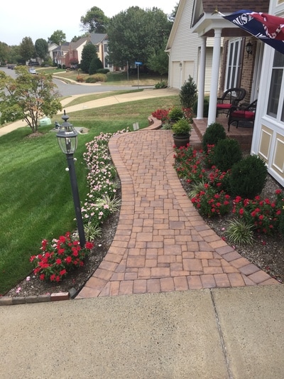 Paver walkway from the driveway to the front door.  New paver stoop with bullnose pavers on the steps. 