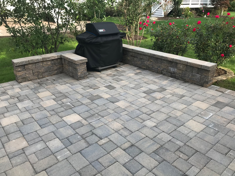Paver patio.  Paver seating walll.  Paver grill insert. 