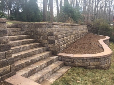 Wallstone retaining walls and steps.  Wallstone raised beds. 