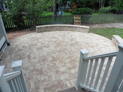 Paver patio with seating walls and capstone. 