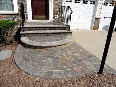Paver walkway and stoop with bullnose steps. 